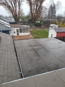 after picture of roof unburied in leaves